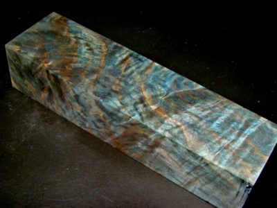 Stabilized and dyed wood